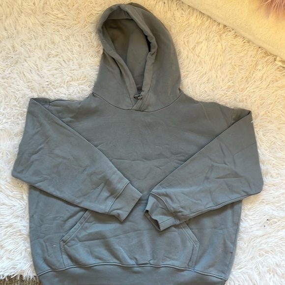 This is an H&M blue is gray hoodie in women's size medium - Picture 1 of 4